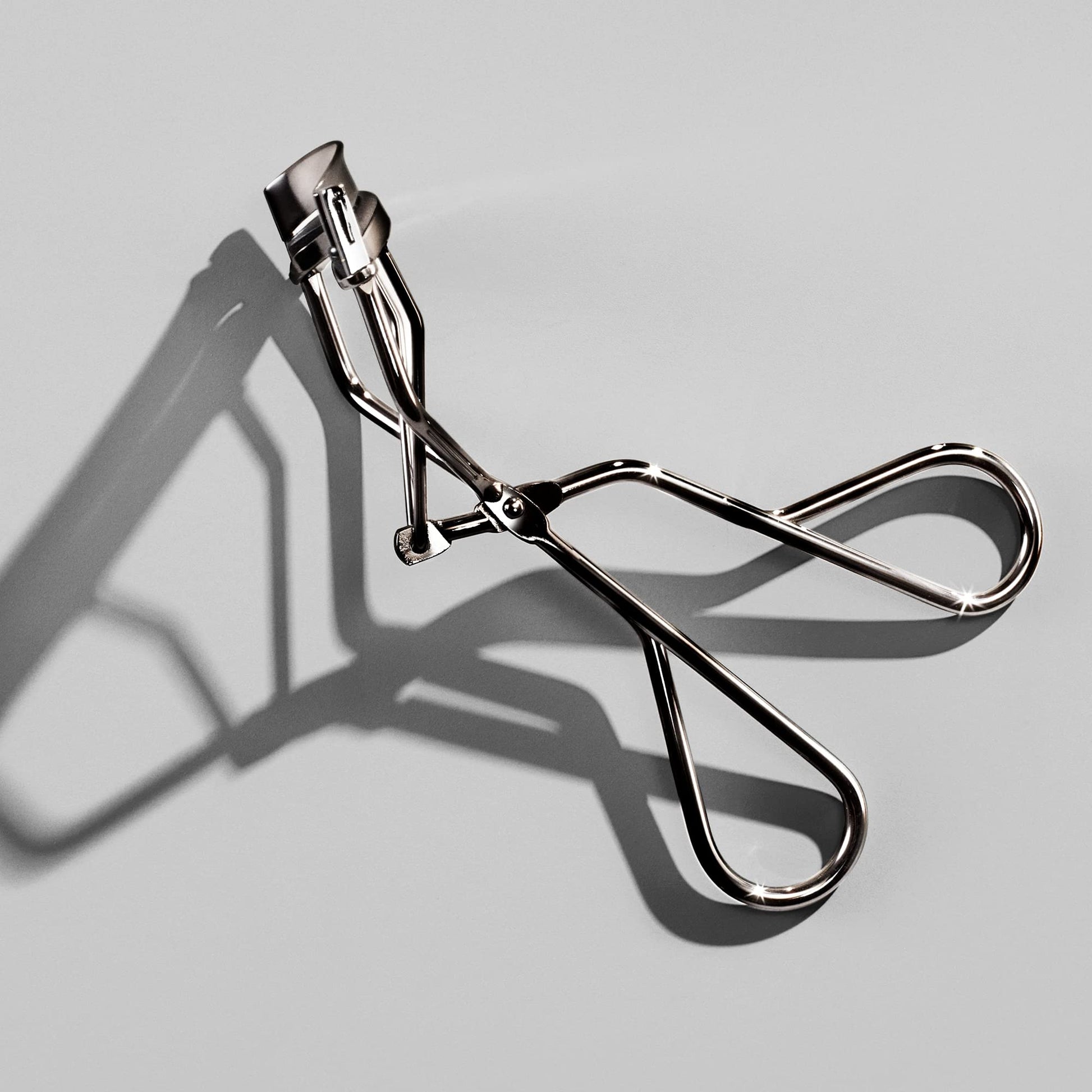 Shiseido Eyelash Curler - Crimps & Curls Lashes for Perfect, Eye-Framing Fringe - Gentle & Safe - Includes Replacement Pad ShiseidoBuy Supplements Australia