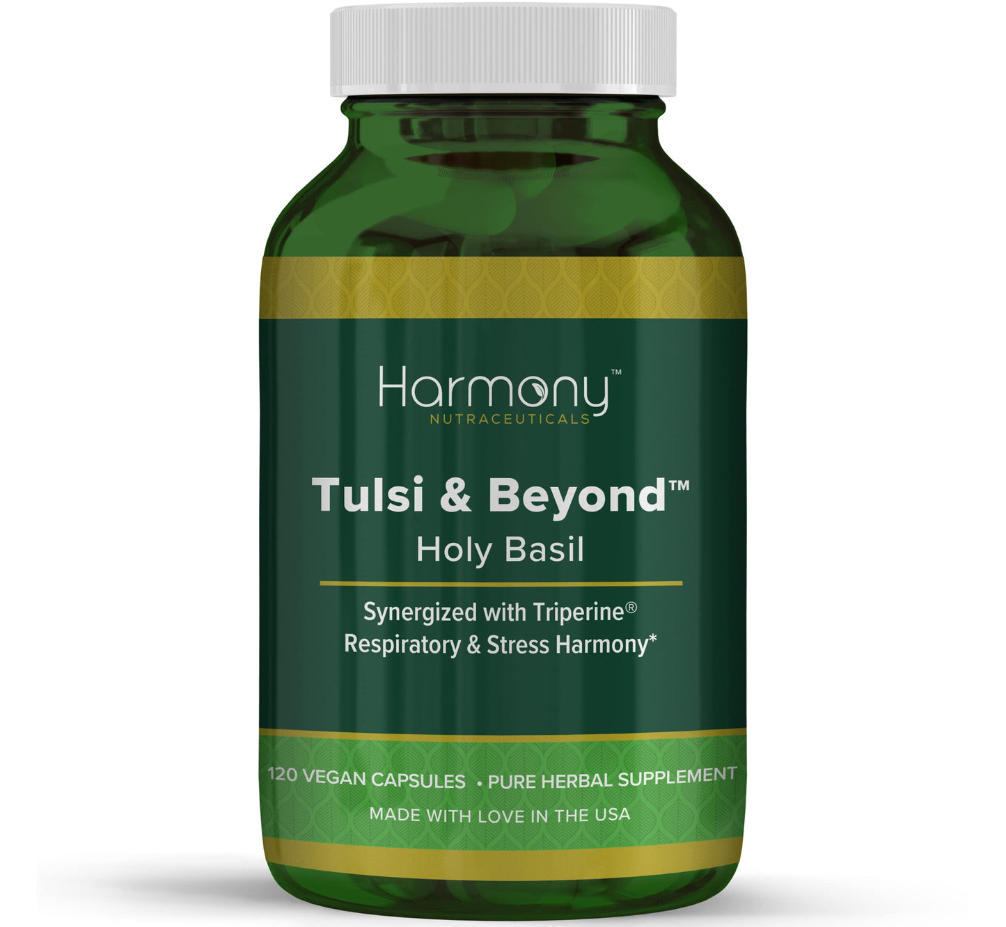 Green supplement bottle labeled 'Harmony Tulsi & Beyond' on a white background